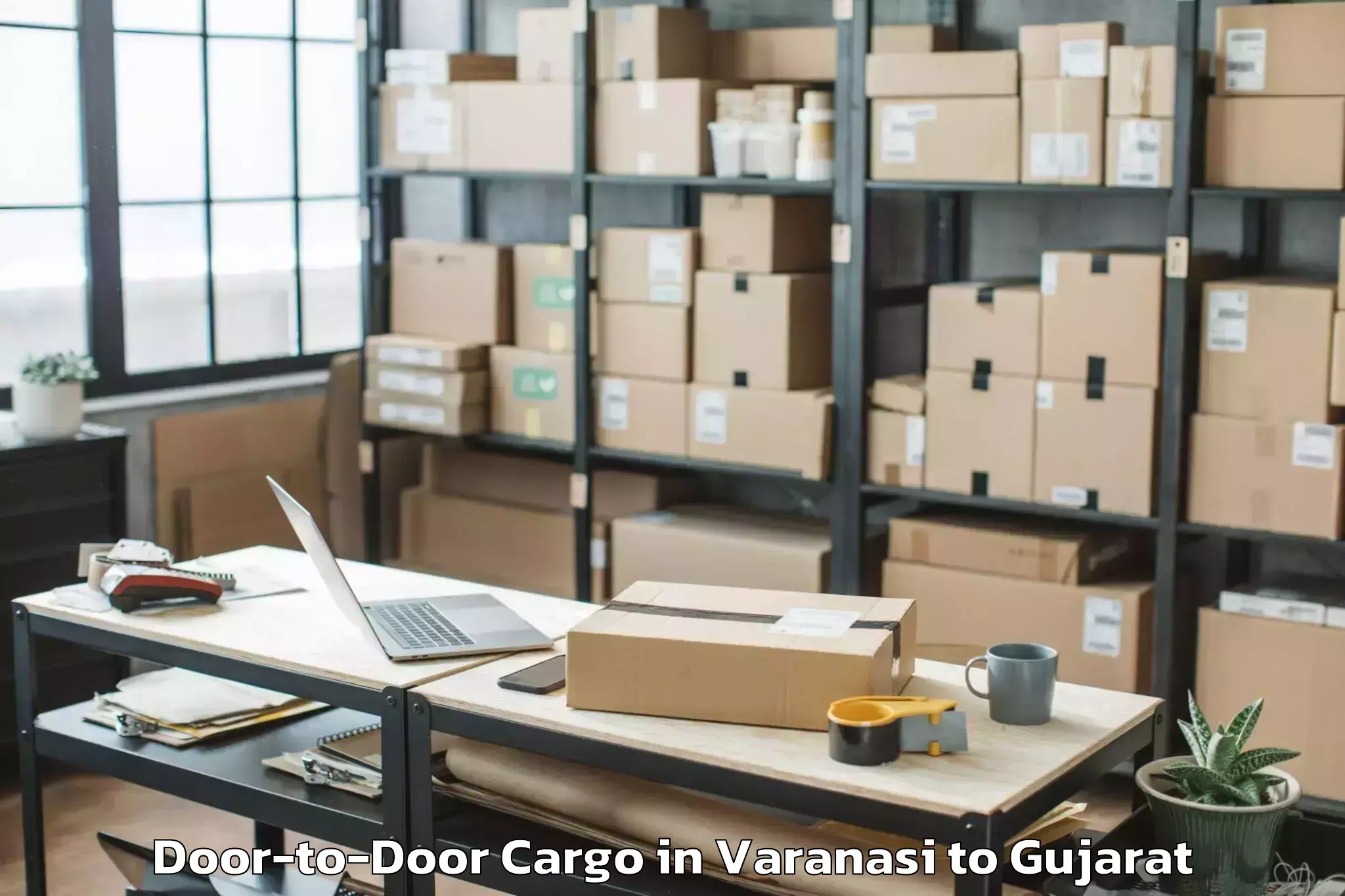 Book Varanasi to Vaghodia Ina Door To Door Cargo Online